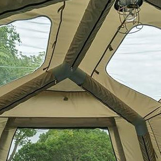 Outdoor tent details showing pressure relief valve, air beams, skylights, stove jack, power cord access, and ventilation windows.